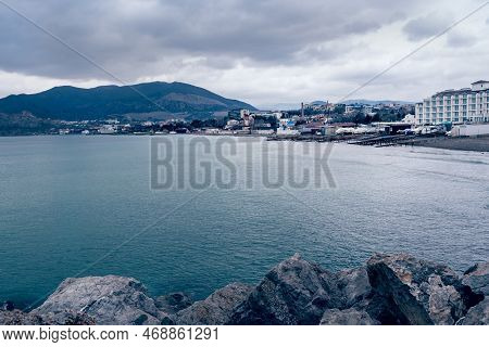 View On Coast Of The Black Sea Of Sudak From Cape Alchak In Cloudy Weather In Spring. Crimea