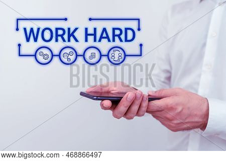 Text Caption Presenting Work Hard. Business Showcase Laboring That Puts Effort Into Doing And Comple