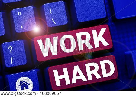 Hand Writing Sign Work Hard. Business Idea Laboring That Puts Effort Into Doing And Completing Tasks
