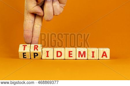 Covid-19 Epidemic Or Tridemic Symbol. Concept Word Epidemic And Tridemic On Wooden Cubes. Doctor Han