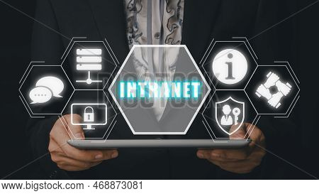 Intranet Concept, Businessman Using Digital Tablet With Intranet Icon On Virtual Screen.