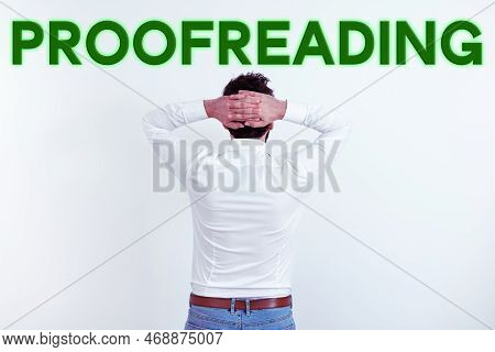 Hand Writing Sign Proofreading. Concept Meaning Act Of Reading And Marking Spelling, Grammar And Syn