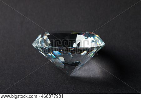 Beautiful Dazzling Diamond On Dark Background, Closeup. Precious Gemstone