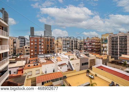 View Of Typical Inner Courtyard In The Eixample District, Barcelona, Catalonia, Spain On Cloudy Day 