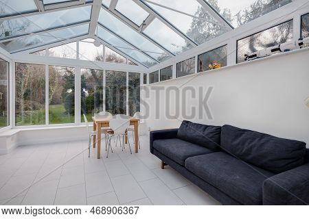 Great Shelford, Cambridgeshire - Jan 2 2019: Furnished White Upvc Garden Room Conservatory
