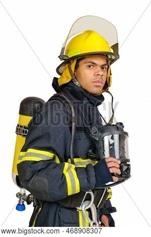 Young African American Fireman With Respirator And Air Breathing Apparatus On His Back In Protective