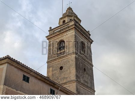 Catholic Christian Parish Church In The Majorcan Town Of Ca's Concos At Sunset. Island Of Mallorca, 