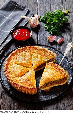 Sliced Ground Beef Meat Pie With A Flaky Puff Pastry Double Crust With Hearty Minced Beef Cooked Wit