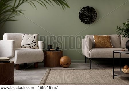 Stylish Composition Of Living Room Interior With Green Wall, Grey Sofa With Brown Pillow. White Armc