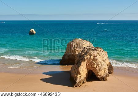 Beautiful View Of Limestone Rocks On The Praia Dos Tres Castelos. Portimão City, Portugal