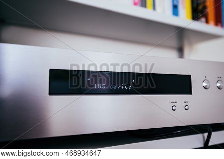 Paris, France - Dec 13, 2022: Setting Up Ios Device On The Display Of New Onkyo Ns-6170 Network Audi