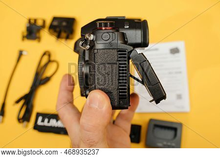 Paris, France - Nov 20, 2022: Pov Male Hand Holding New Panasonic Lumix Dmc-gh6 Micro Four Thirds Sy