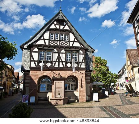 HOFHEIM, GERMANY - JUNE 2, 2011: old german renovated half timbered house under blue sky