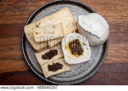 Italian Cheese Collection, Yellow Taleggio Cheese And Mozzarella With Black Truffles Mushrooms