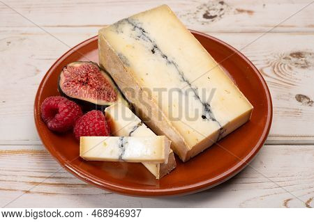French Semi-soft Cow Milk Cheese Morbier From Franche-comte Region With Thin Black Layer And Strong