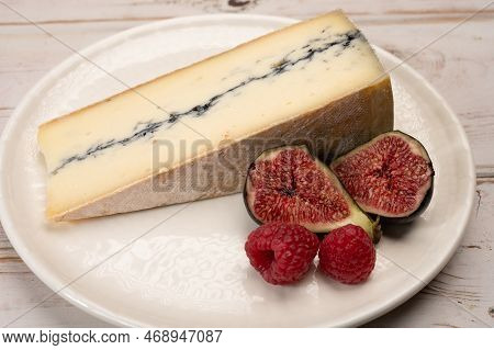 French Semi-soft Cow Milk Cheese Morbier From Franche-comte Region With Thin Black Layer And Strong