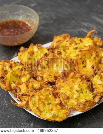 Bakwan Is A Fried Food Made From Vegetables And Flour That Is Commonly Found In Indonesia. Served Wi