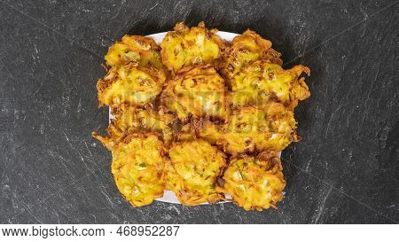 Bakwan Is A Fried Food Made From Vegetables And Flour That Is Commonly Found In Indonesia. Served Wi