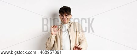 Disgusted Guy Grimacing And Jumping Away From Something Nasty, Stare With Aversion And Dislike, Reje