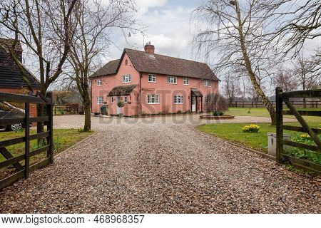 Cromwell Cottage, Kennett, Suffolk, England - March 1 2019: Substantial Detached Cottage Within Land