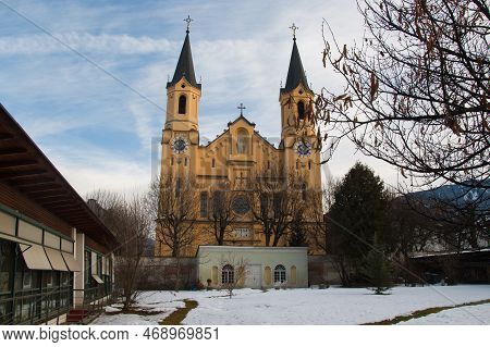 Brunico, Italy - December 29, 2022: View Of Parish Church Assumption Of St. Mary (chiesa Di Santa Ma