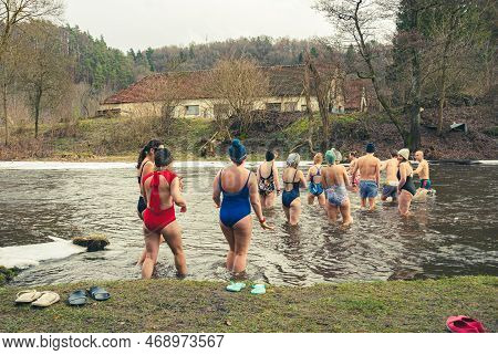 Vilnius, Lithuania - January 15 2023: Group Of People Ice Bathing Together In The Cold Water Of A Ri