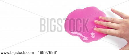 Hand Playing With Textured Slime On White Background. Teen Hand Holding Pink Shining Slime With Bubb