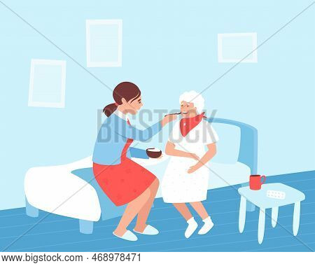 A Nurse Feeds An Elderly Woman In A Nursing Home Or Clinic. The Concept Of Medical Care For The Elde