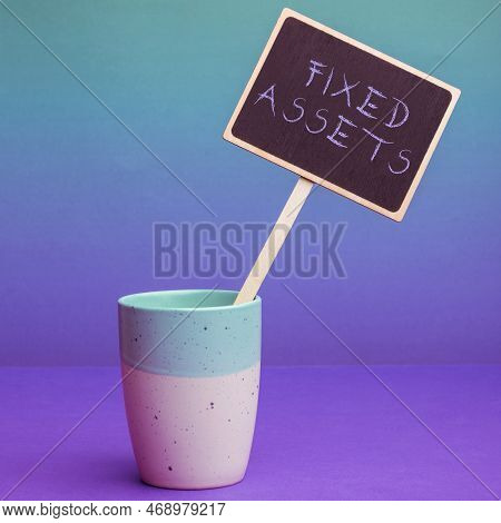 Handwriting Text Fixed Assets. Word For Long-term Tangible Piece Of Property Or Equipment A Firm Own