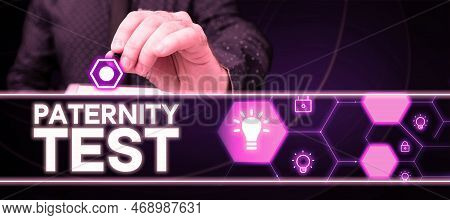 Hand Writing Sign Paternity Test. Concept Meaning A Test Of Dna To Determine Whether A Given Man Is 