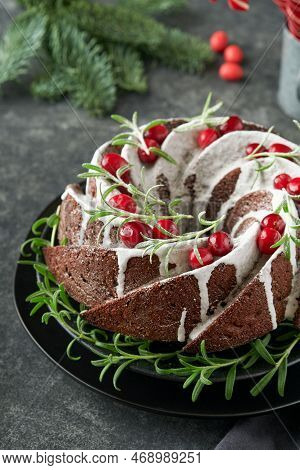 Christmas Chocolate Bundt Cake. Traditional Christmas Fruit Cake With White Glaze, Cranberries And R