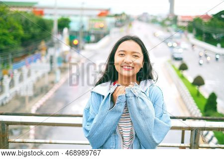 Portrait Happy Young Girl With Beautiful Landscape View At Roiet Thailand.