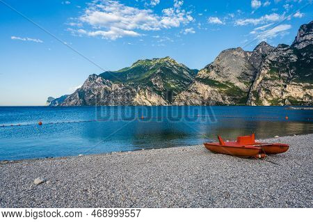 Stone Beach In Italy Without People, North Shore Of The Lake Lago Di Garda Near Torbole, Nago-torbol
