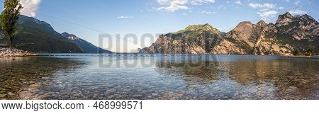 Stone Beach In Italy Without People, North Shore Of The Lake Lago Di Garda Near Torbole, Nago-torbol