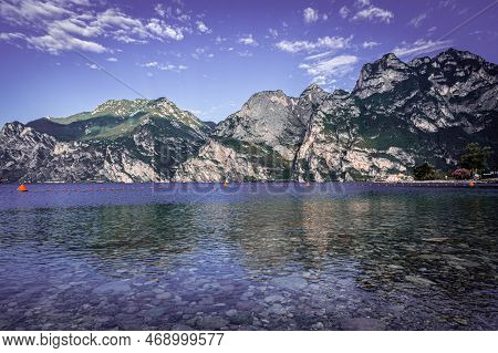Stone Beach In Italy Without People, North Shore Of The Lake Lago Di Garda Near Torbole, Nago-torbol