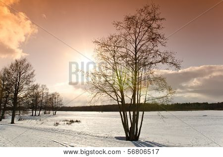 Sunset on a frozen lake