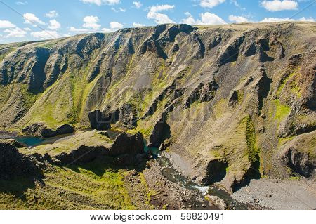 Canyon with a river near the Fagrifoss waterfall. It is located on the South of Iceland not far from the volcano Laki