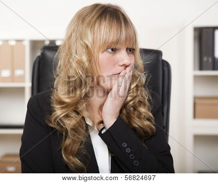 Young Businesswoman Looking Worried