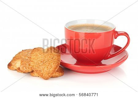 Red coffee cup and heart shaped cookies. Isolated on white background