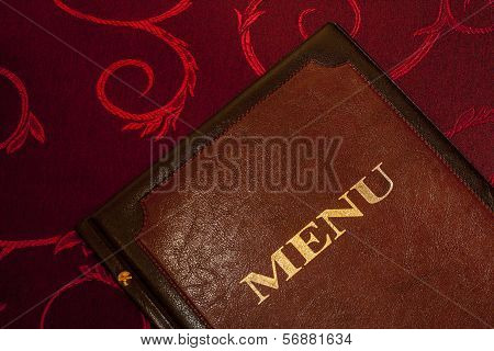 Menu card in leather cover.
