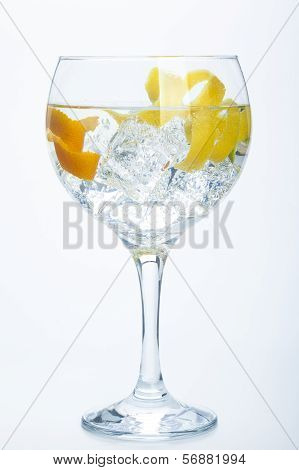 Orange Lemon And Lime Gin Tonic Isolated Over White