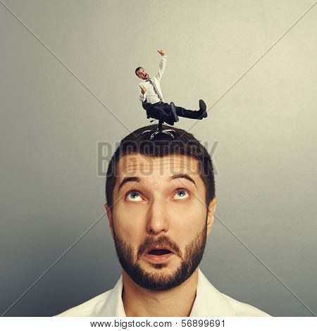 laughing man rolling on the big head