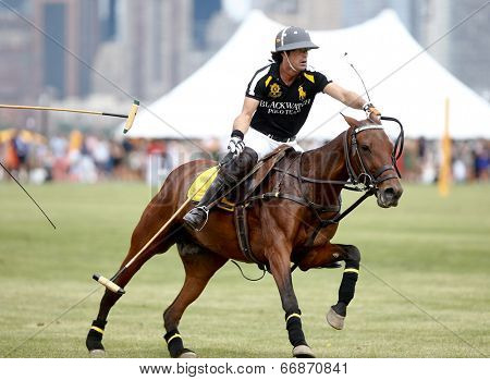 JERSEY CITY, NJ-MAY 31: Nacho Figueras in action during the polo match at the 7th Annual Veuve Cliquot Polo Classic at Liberty State Park on May 31, 2014 in Jersey City, NJ.