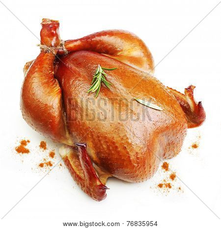 Roast chicken with rosemary spice  isolated on white background.