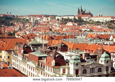 Houses with traditional red roofs in Prague Old Town Square in the Czech Republic