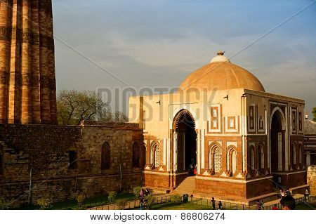 People Looking At The Qutub Minar Delhi