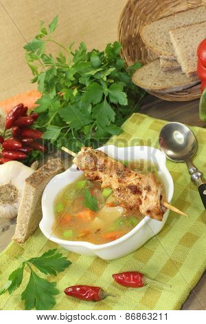 Poultry Consomme With Chicken Skewers