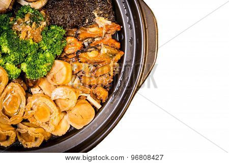 Chinese styled Abalone mixed dish. Also known as Poon Choy in Chinese. Isolated in white.