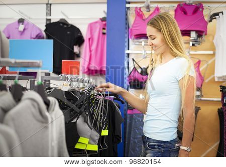 Young Woman Shopping For Sportswear