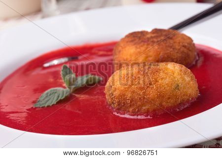 Strawberry Soup With Italian Fried Rice Balls Arancini.